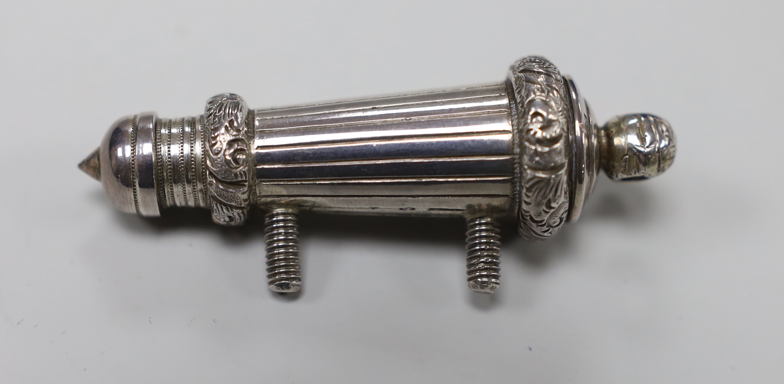 An Edwardian silver military whistle and case, Joseph Jennens & Co, Birmingham, 1902, 68mm.